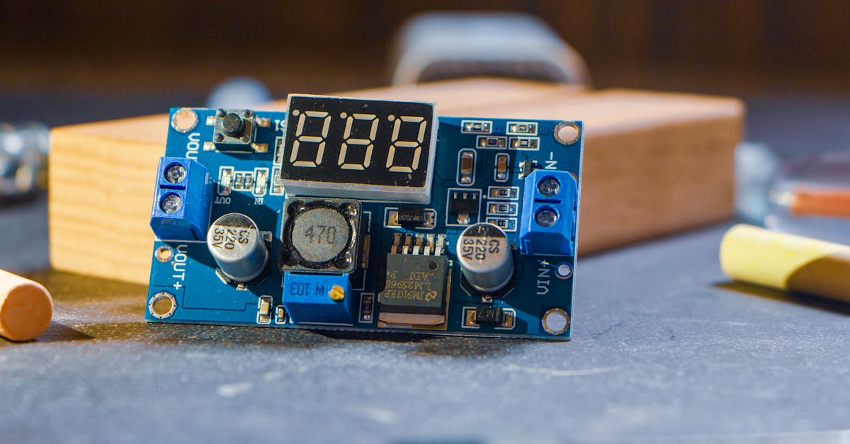 high quality close up of a digital electronic circuit board in a workshop setting